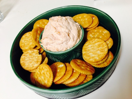 Blend together (either by hand or electric mixer) one can of fish (I used salmon) 200g of softened cream cheese, one tablespoon lemon juice,one tablespoon cream and a pinch of fresh dill. Serve with something pedestrian, like Ritz crackers. This IS Carpmas after all.